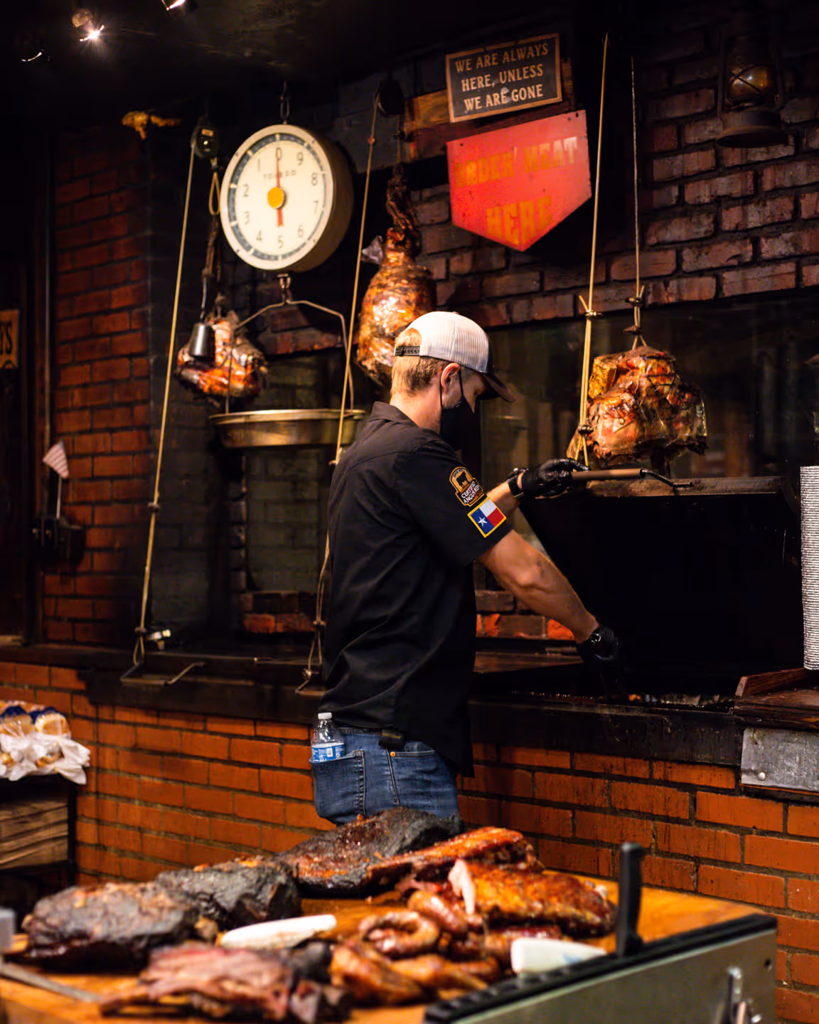 Black's Barbecue Employee preparing food
